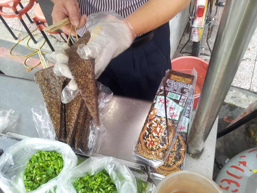 古早味-「豬血糕」（ 龍山寺美食）/（15年老店）/（TVBS 採訪） 的照片