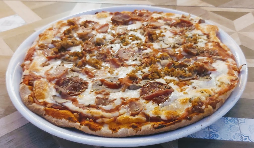 Restaurante En Clave — Pizza