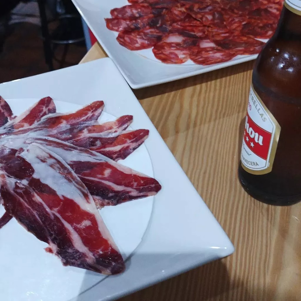 El Porton de Candelario — Comida y bebida