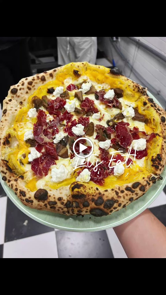 La Vera pizza artesanal — Comida y bebida
