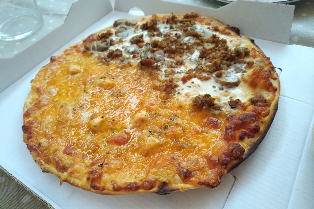 Pizzeria Saque — Comida y bebida