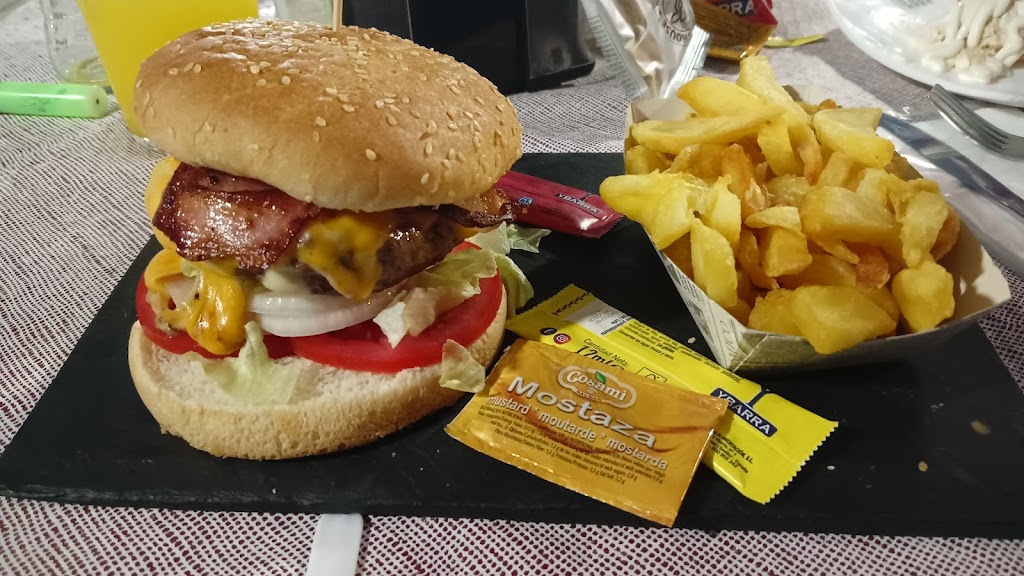Bar restaurante The Steak House Moron — Comida y bebida