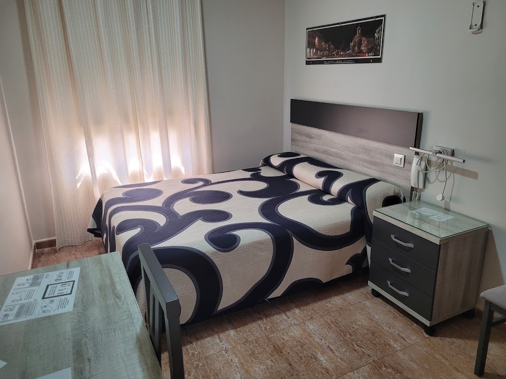 Hostal El Paraiso — Habitaciones
