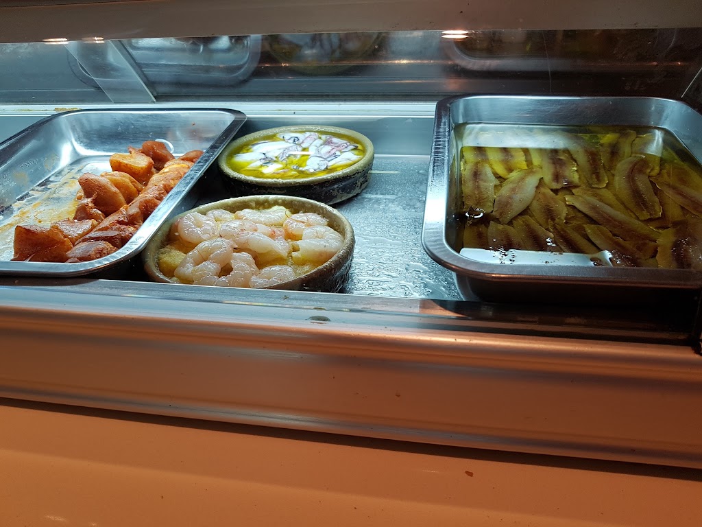 Estacion de Servicio Repsol — Alimento