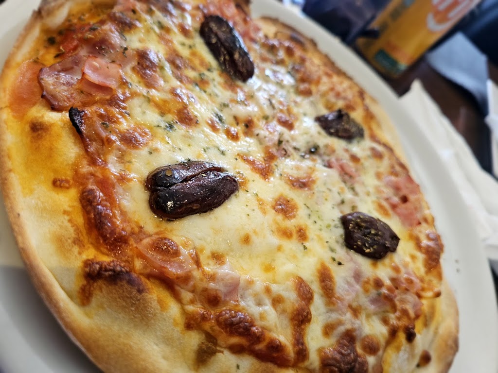 Pizzeria S'Estatua Llucmajor — Comida y bebida