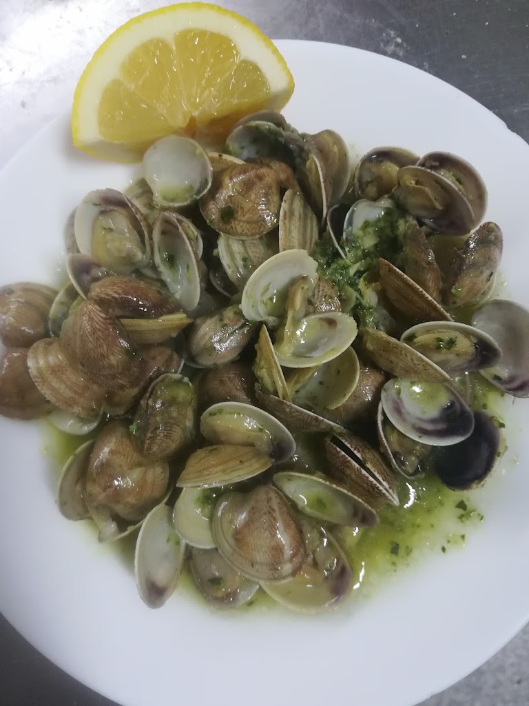 El Buho Bar — Comida y bebida