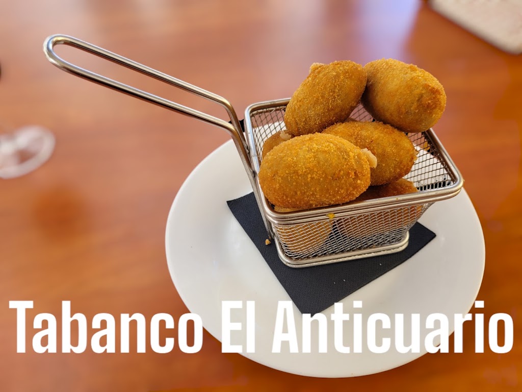 Tabanco El Anticuario — Comida y bebida