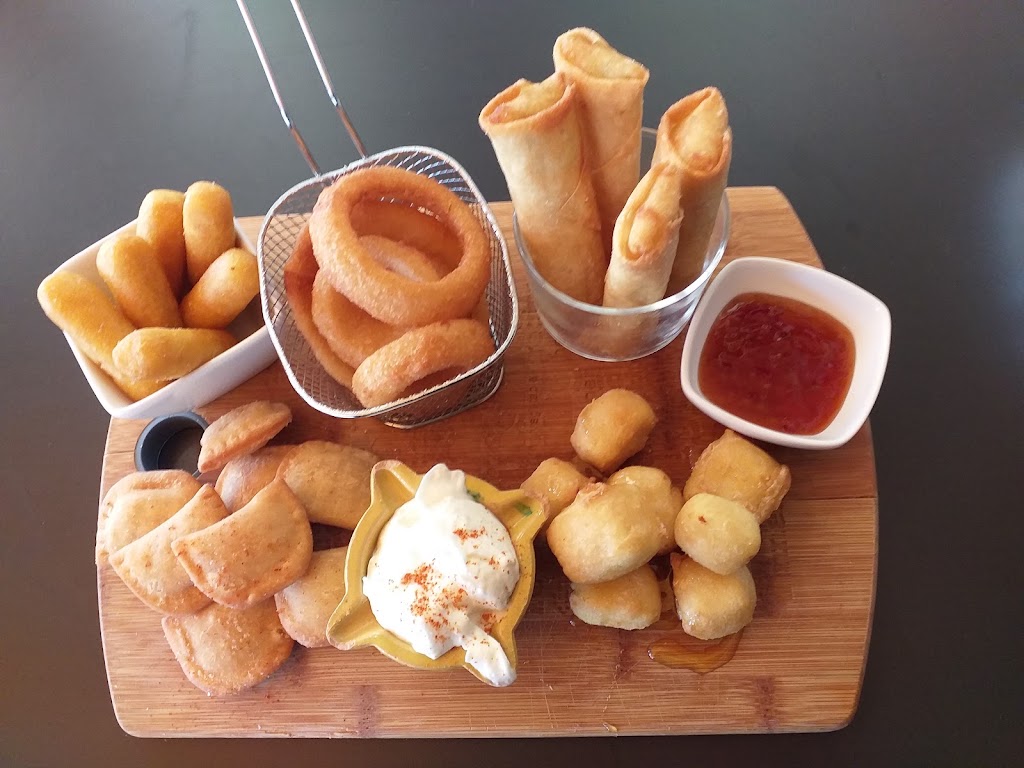 El Scarpito — Comida y bebida