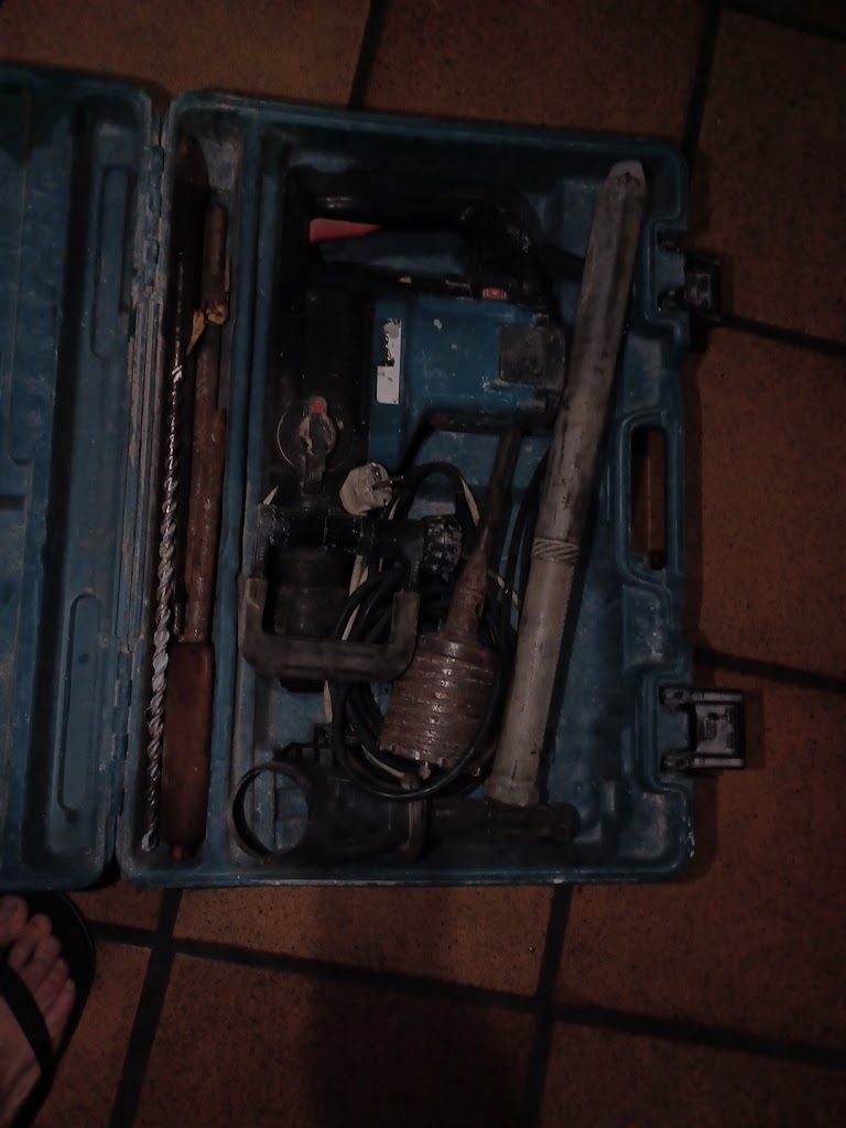 Taller reparacion de maquina de obra corfa