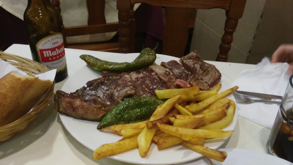 Restaurante Guernica Carnes a la Parrilla — Comida y bebida
