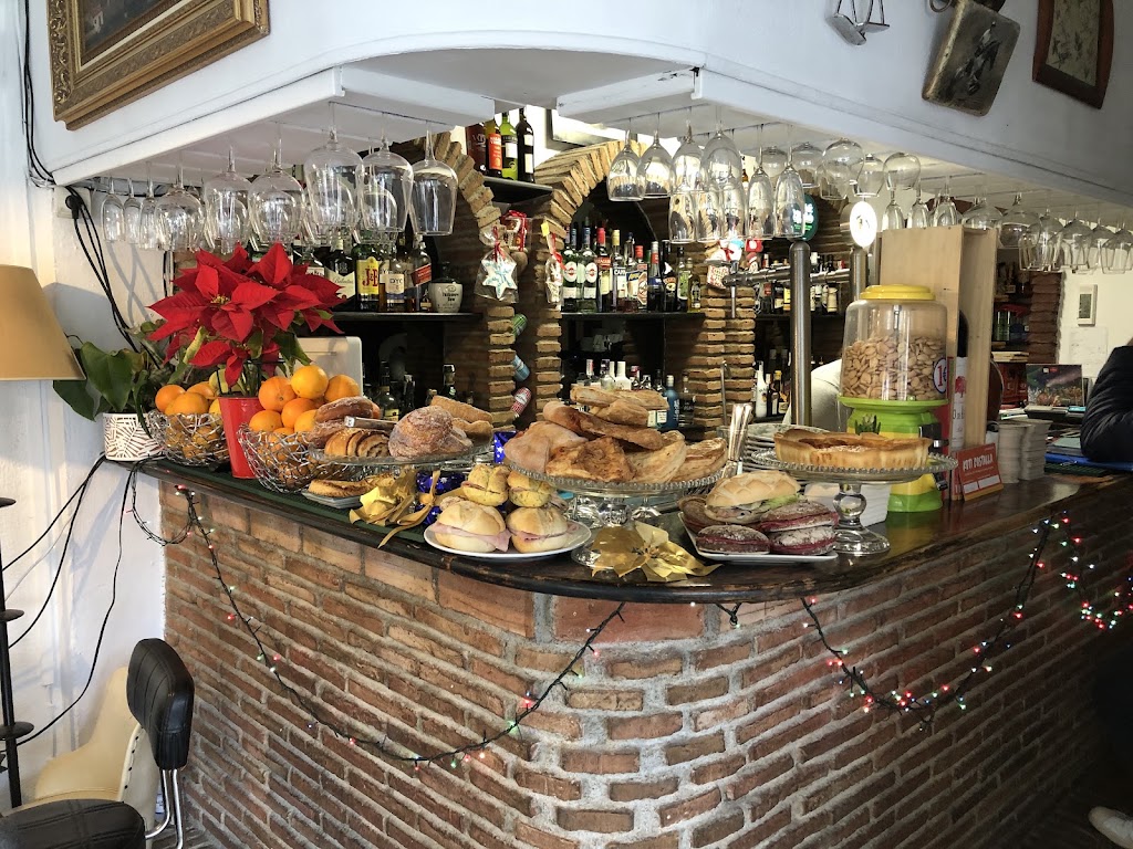 Yupiter Bar — Comida y bebida