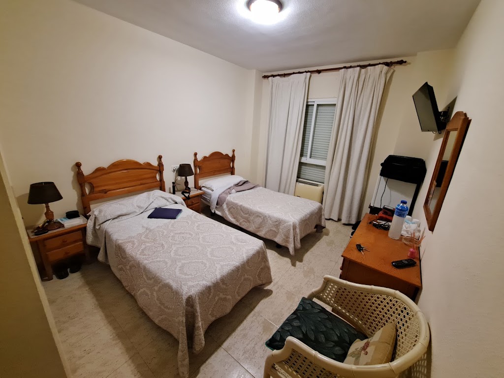 Hostal Galea Centro — Habitaciones