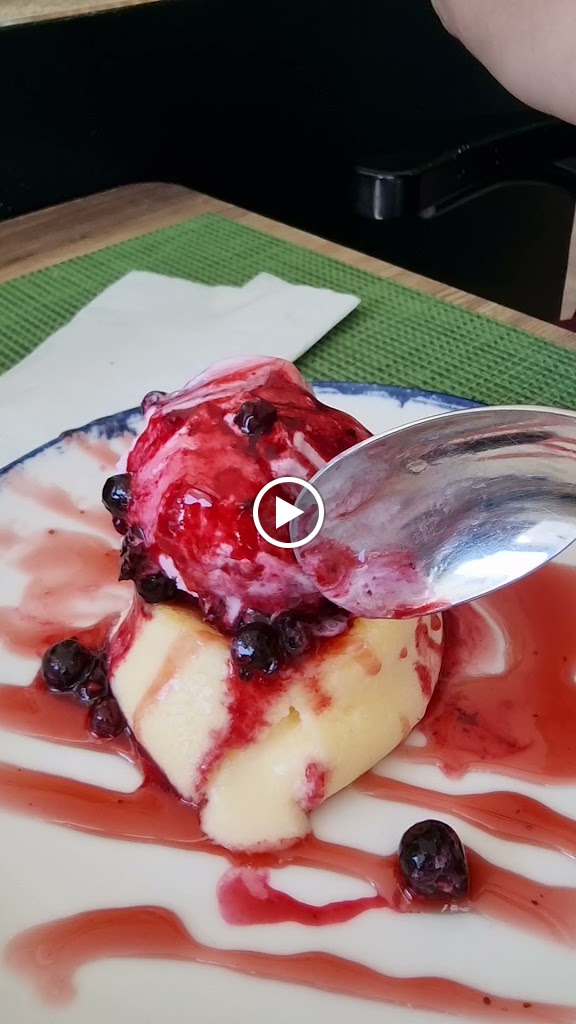 Oasis Restaurante Arroceria — Videos
