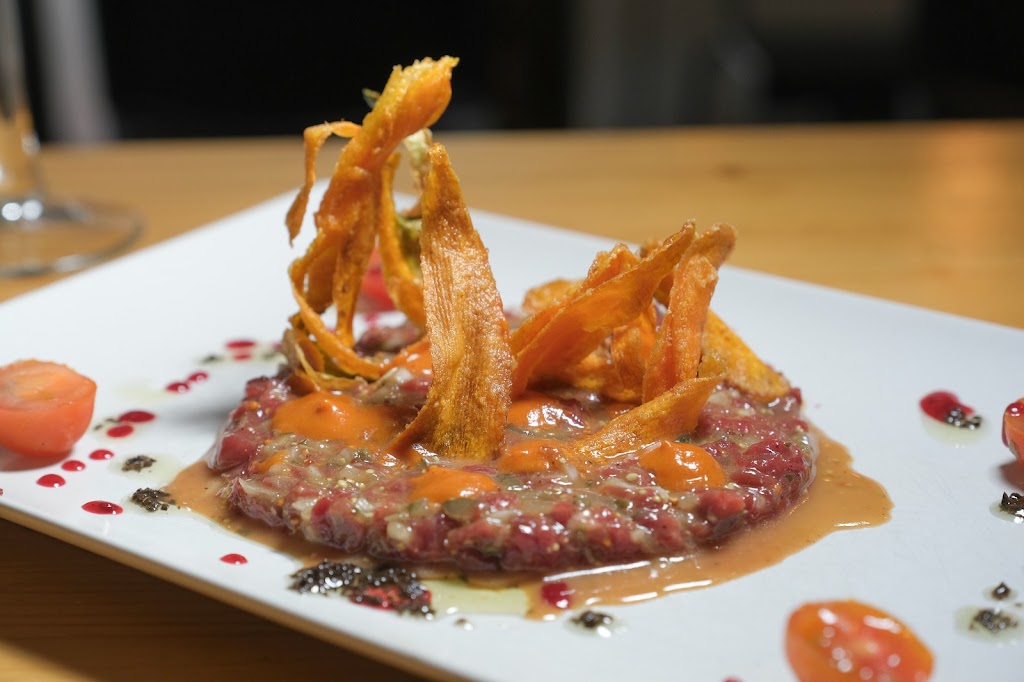 Restaurante La Tapinya — Comida y bebida