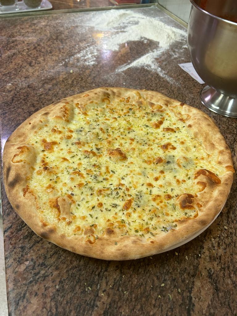 Restaurante Pizzeria El Imperdible — Pizza