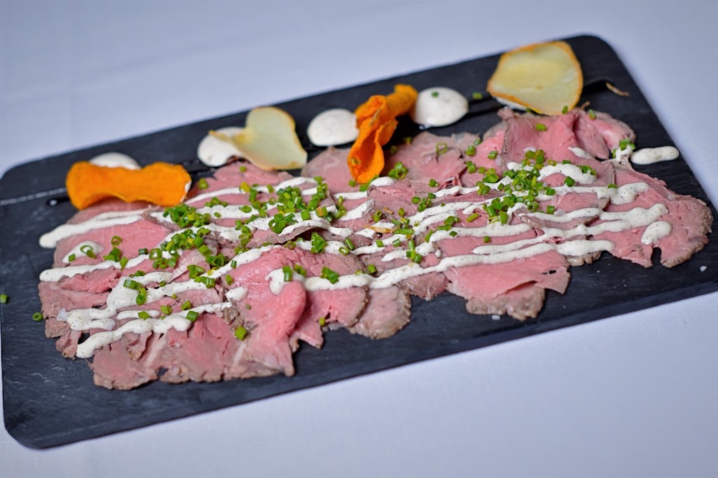 56o Restaurant & Grill — Comida y bebida