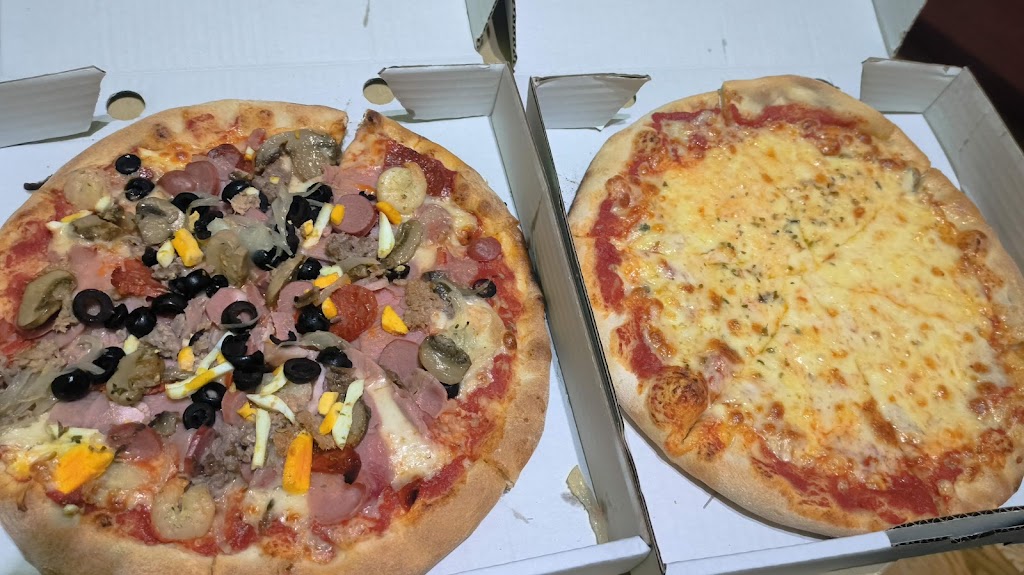 Cristian Pizzeria — Comida y bebida