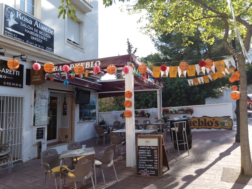 Pueblos Bar — Ambiente