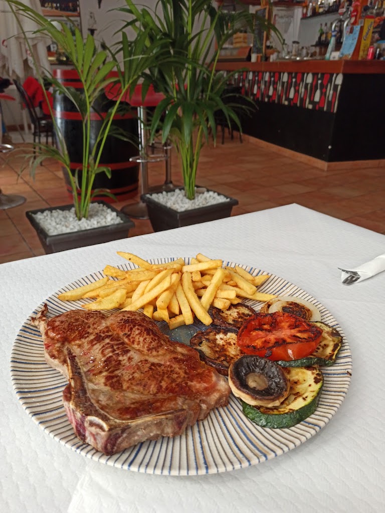 +QUE Bar Restaurante. — Papas fritas