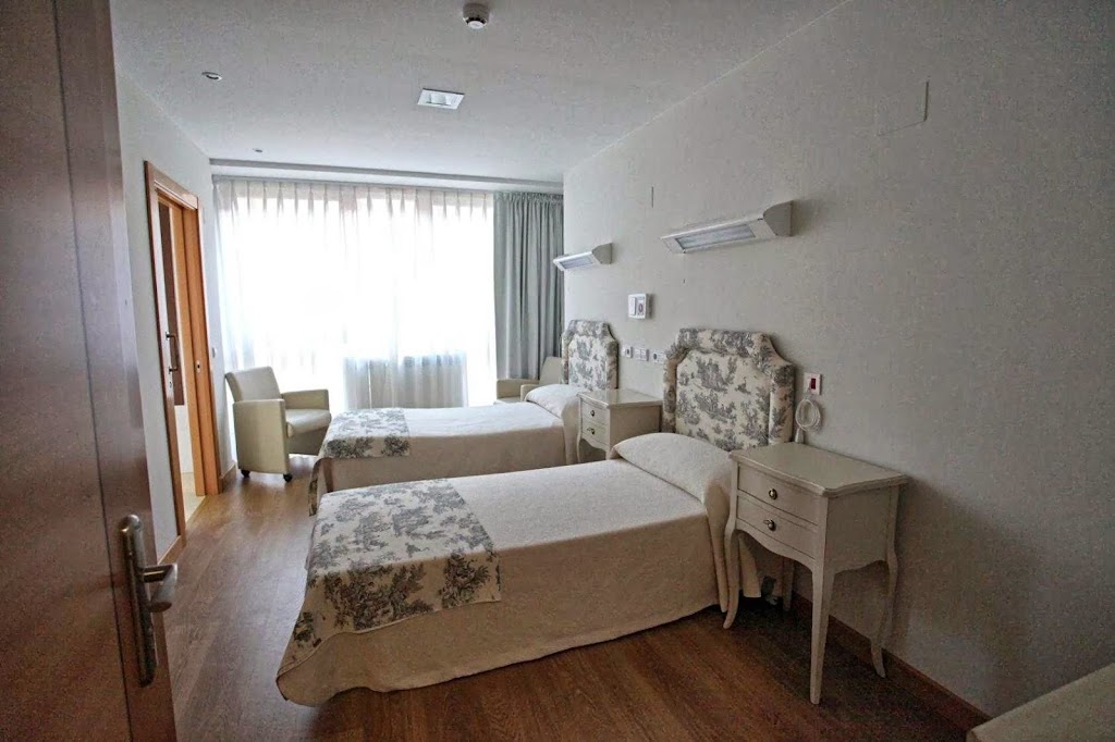 Residencia Aramo Auditorio — Habitaciones