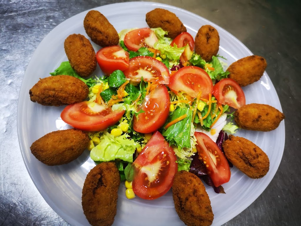 El Estudiante Restaurante — Comida y bebida