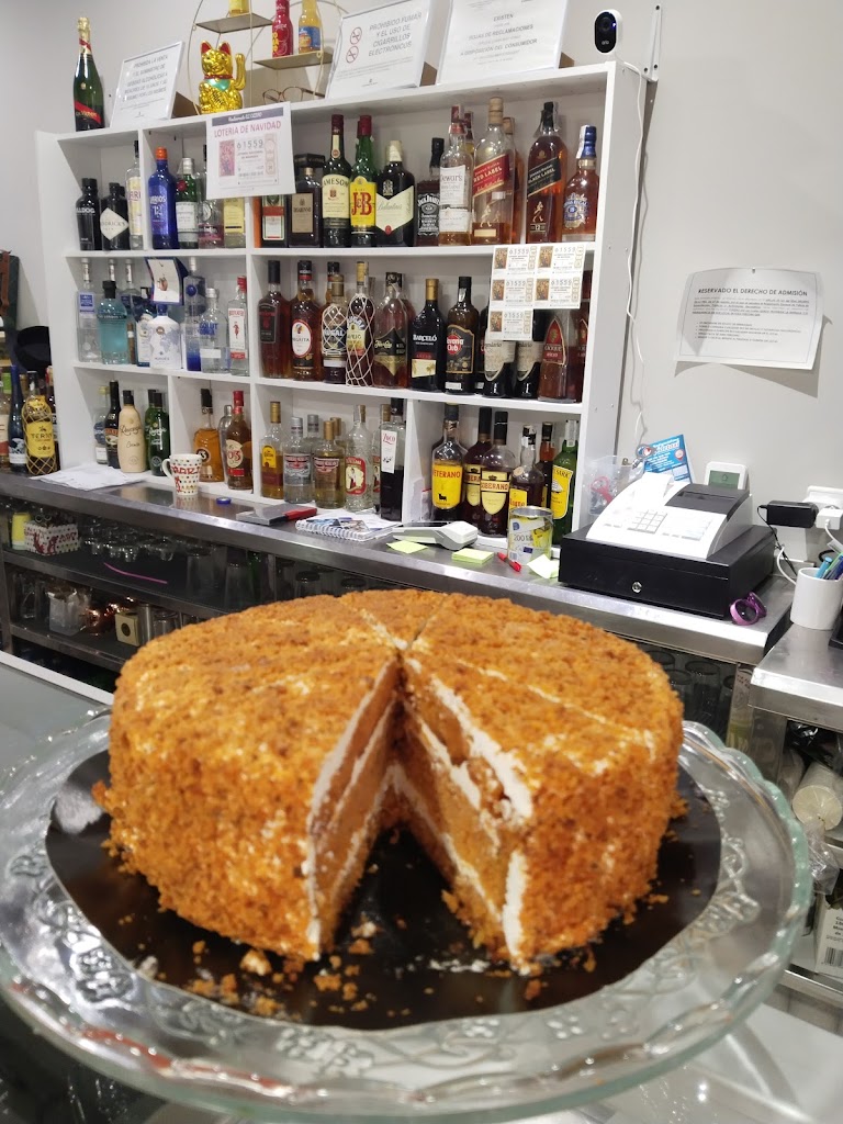 El Olivo Bar — Comida y bebida