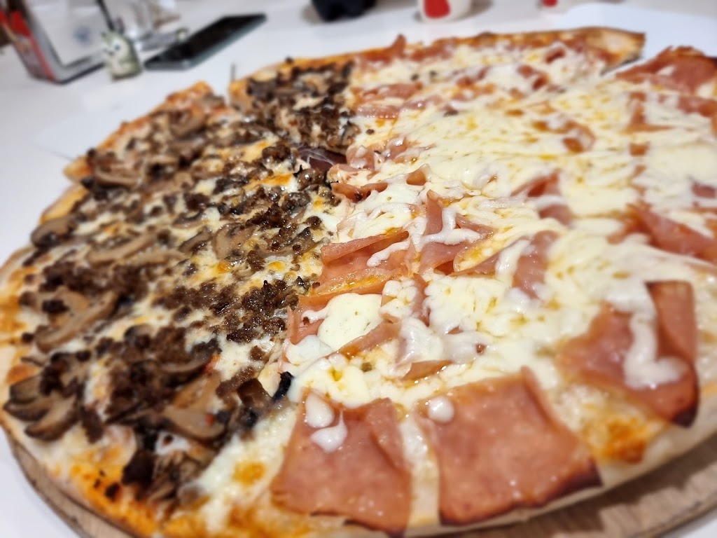 CACHO PIZZA — Comida y bebida