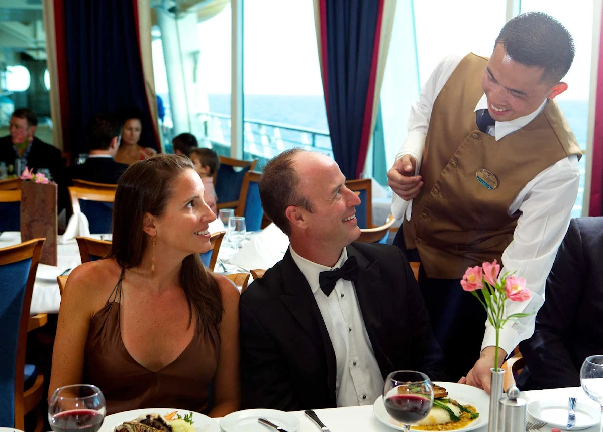 Freedom-of-the-Seas-dining-room - Enjoy sumptuous ocean views while dining during your sailing to the Caribbean aboard Freedom of the Seas.