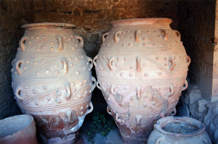 Six-foot-tall pithoi, or storage jars, at the Palace of Knossos. The jars, dating from the 18th century B.C., were used to store honey, wine and food. 