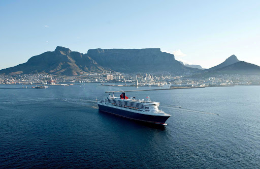 Cunard-Queen-Mary-2-in-Cape-Town - Take in sweeping views of the mountains and landscape of Cape Town, South Africa, during a sailing aboard Queen Mary 2.