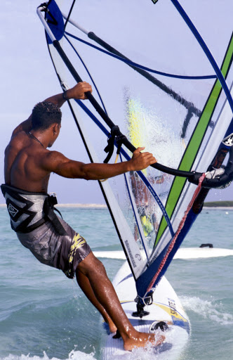 Bonaire-windsurf - A windsurfer does his thing in the waters off Bonaire.