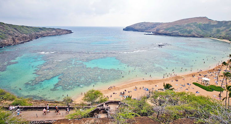 More than 1 million people from around the globe visit Hanauma Bay on Oahu each year. Visitors must watch a short documentary before entering the park. 