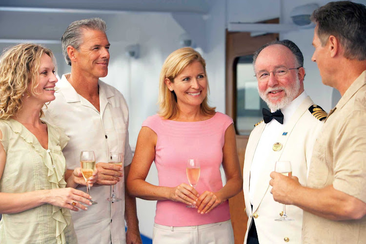 The ship's captain and crew frequenty interact with guests during a Princess cruise.