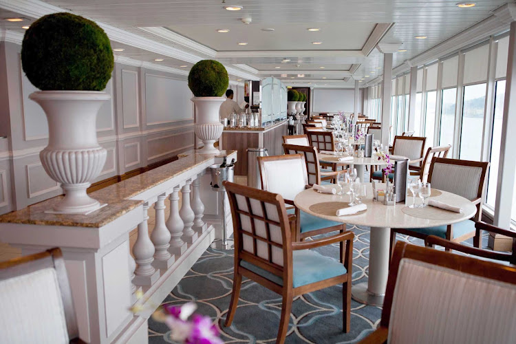 Bright flowers and cool carpets make brunch a breezy affair at Windows Cafe aboard an Azamara ship.