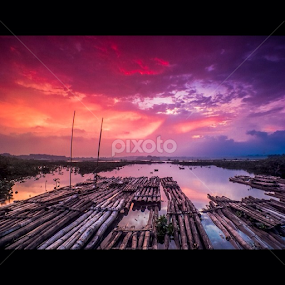 Bright colours in the west, giant butterflies dancing as night crept like a cripple toward the east -Roberto Bolaño- by Wiwid Widya Apriyadi - Landscapes Waterscapes