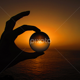 Sunset through a crystal ball by Nicole Rebecca -  