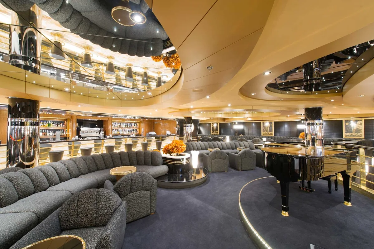 MSC-Preziosa-El-Dorado-Piano-Bar - Sleek and stylish in muted charcoal and gold tones, MSC Preziosa's El Dorado Piano Bar is a cozy place to gather for music and cocktails.