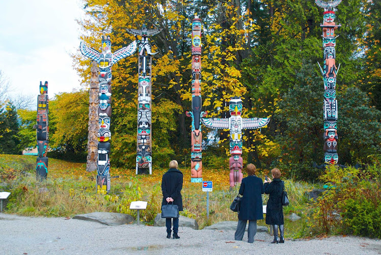A view of totem poles or story poles in Stanley Park, Vancouver, British Columbia