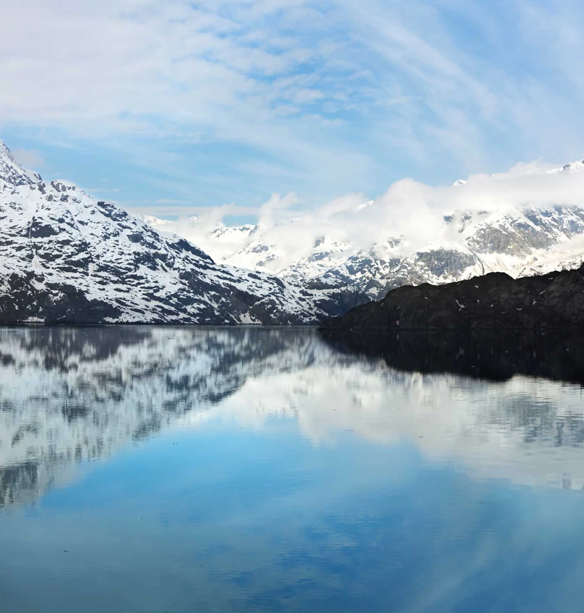 mist-Glacier-Bay - Mist covers part of the glaciers on a cool morning at Glacier Bay National Park, Alaska.