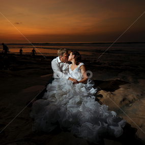 Romantic Kiss by Amin Basyir Supatra - Wedding Bride & Groom
