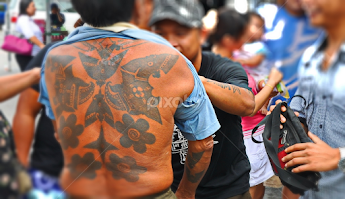 tatoo at the back by Justani Joni -  