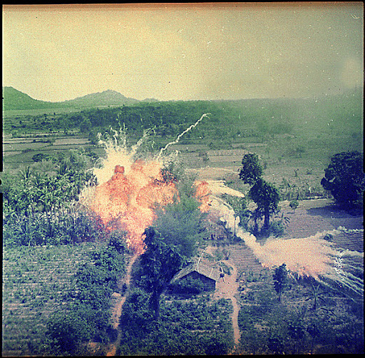 Napalm+bombs+explode+on+Viet+Cong+structures+south+of+Saigon+in+the+Republic+of+Vietnam..jpg%26imgmax%3D640