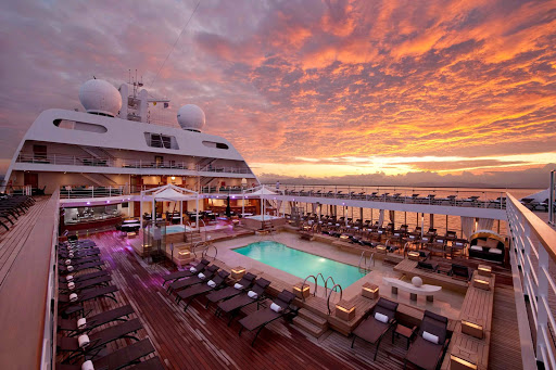 Seabourn_Swimming_Pool_at_Sunrise-1 - Witness the sunrise from the expansive Pool Deck on board Seabourn Quest.
