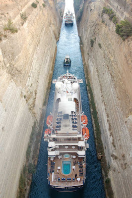 SeaDream I and SeaDream II squeeeeze through Greece's Corinth Canal in the Aegean Sea.