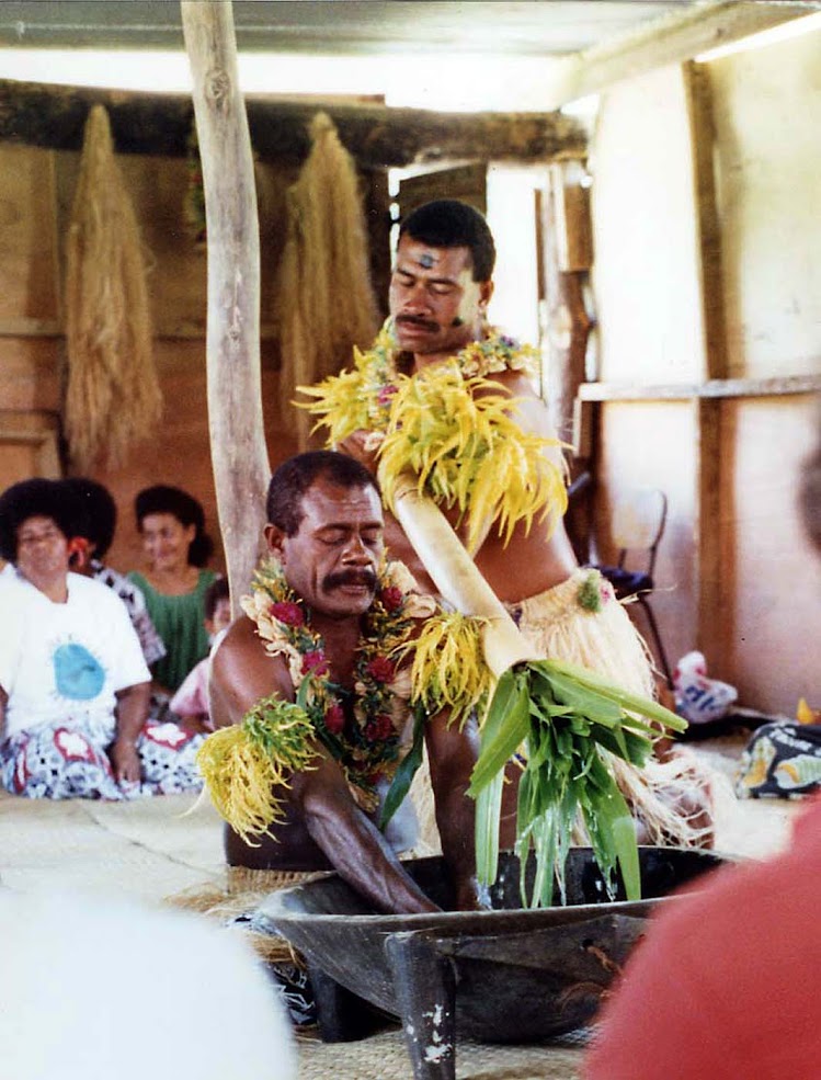 The ceremonial mixing of kava, made from the crushed root of the pepper plant, in Namuamua, Fiji.