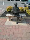Boy Reading Statue at Promenade