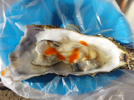 A fresh oyster on Valle de Guadalupe in Ensenada, Mexico.