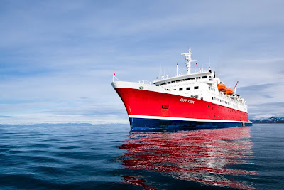 The ship Expedition from G Adventures during a sailing in the Arctic Ocean. 