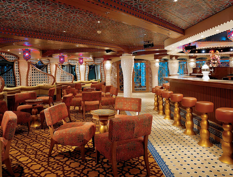 Stop in at Sam's Piano Bar for a drink and live piano music on your next Carnival Miracle cruise.