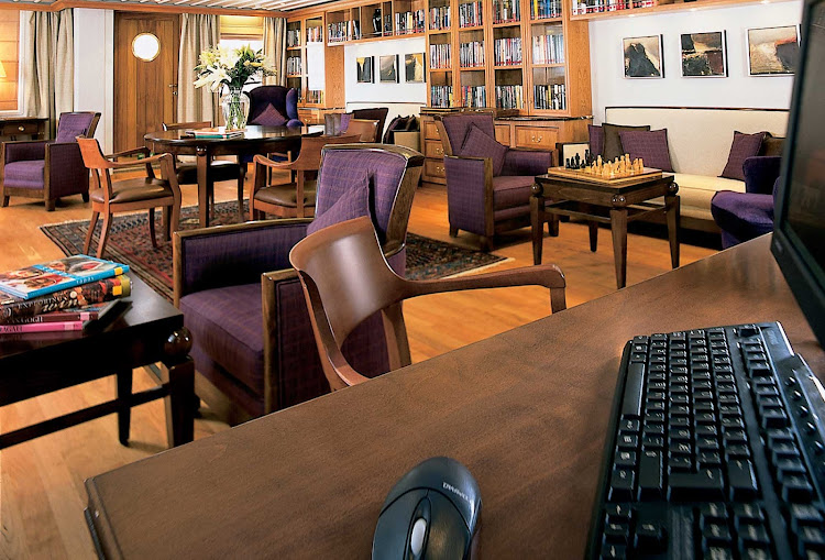 Stay connected with friends and family with an Internet connection in the library aboard a SeaDream ship.